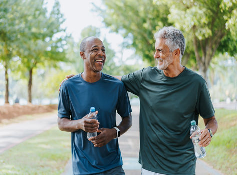 Two men enjoying a walk in a public park