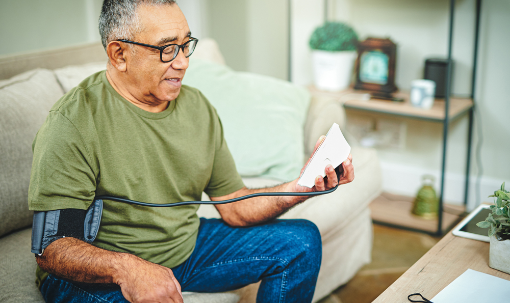 A man measuring his blood pressure